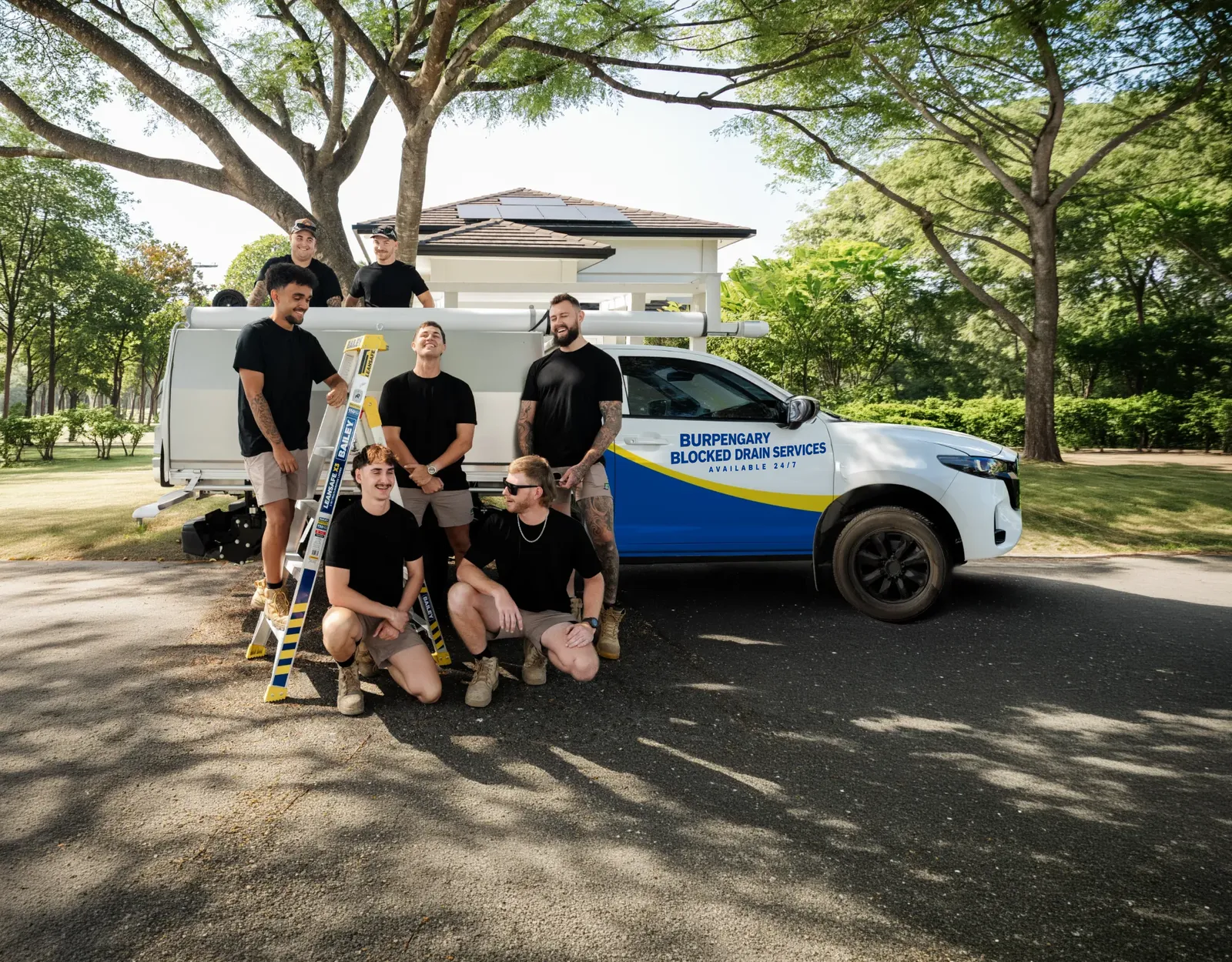 Burpengary Blocked Drain Services team and ute