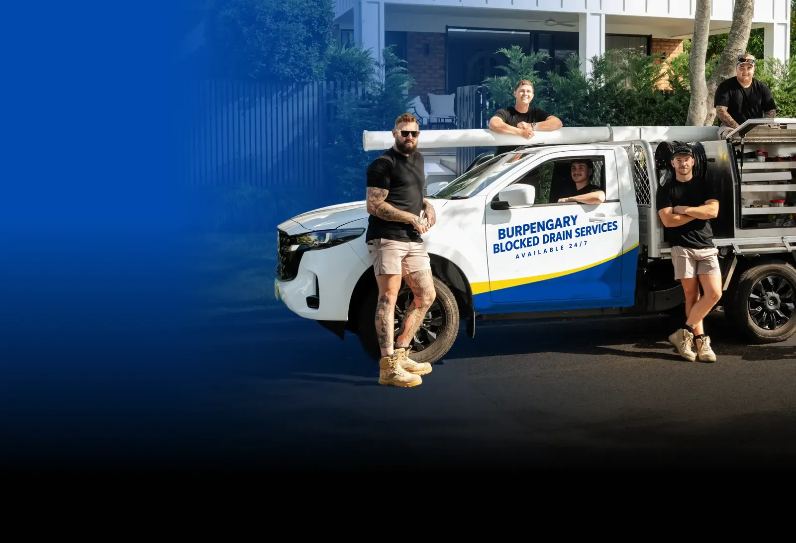 Burpengary Blocked Drain Services team with the ute